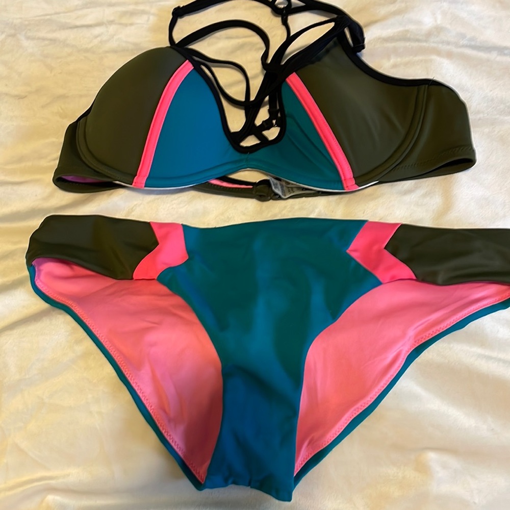 Victoria’s Secret pink swimsuit two piece With T top back and vibrant colors